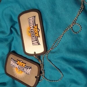 Lots of 2 wwe wrestlemania xxiv souvenir dog tags on chain